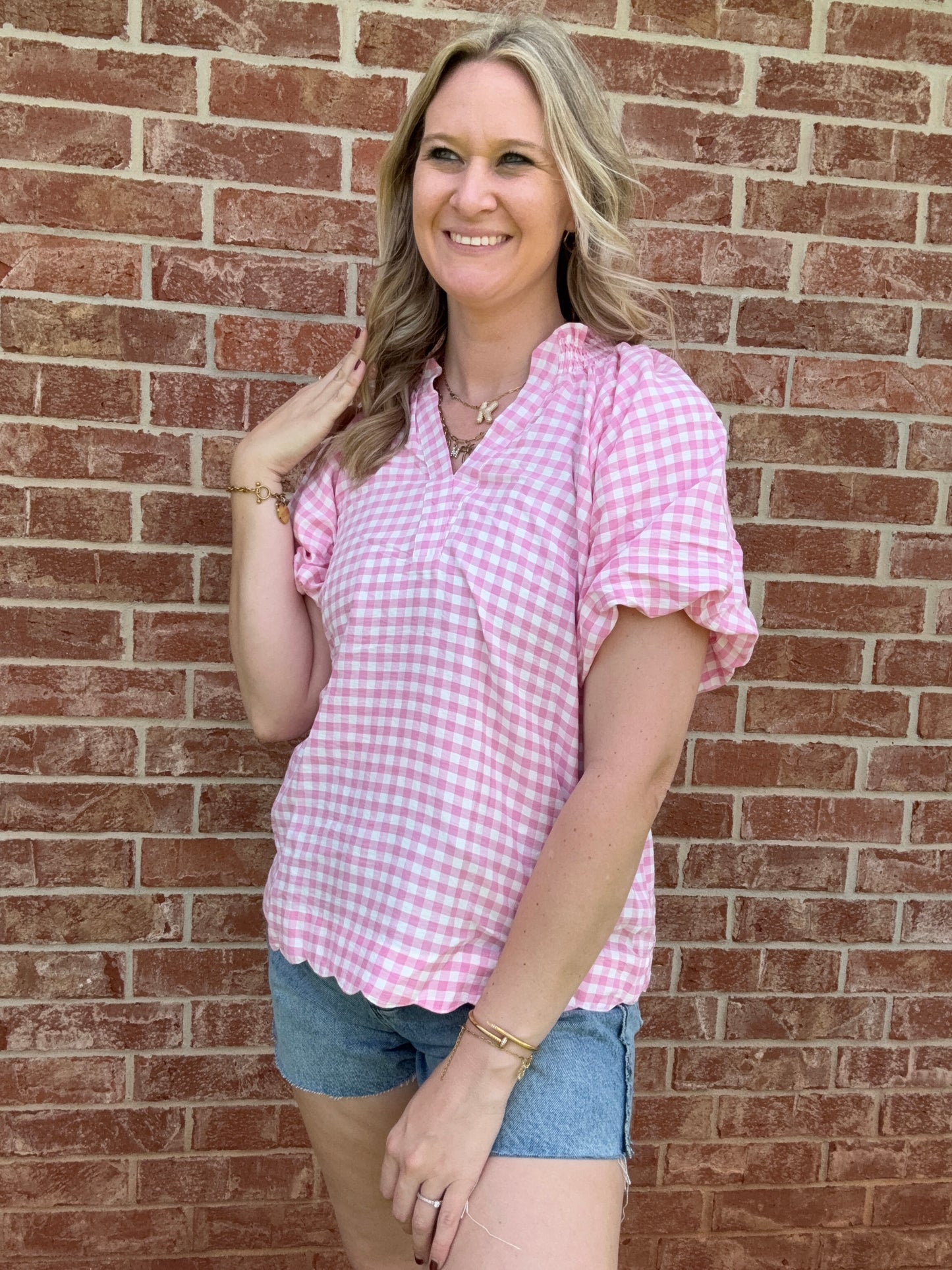 Pink v necked scallop hem blouse